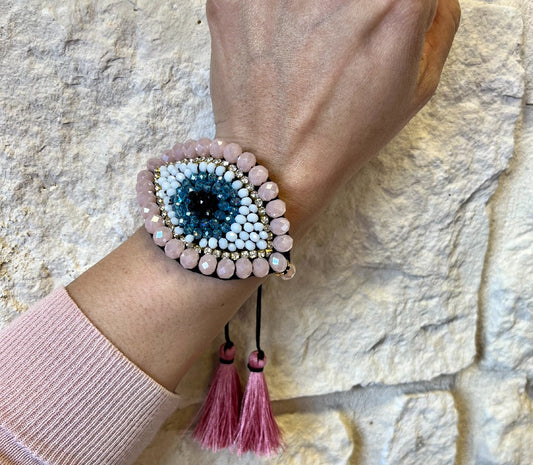 Pulsera grande hecha a mano con mal de ojo