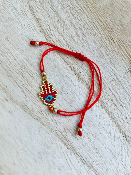 Pulsera roja de Protección